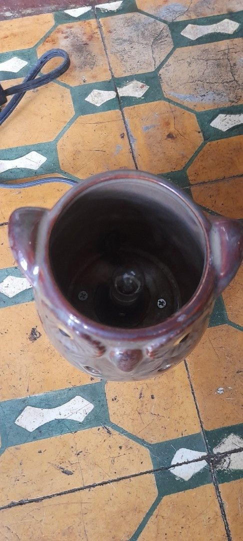Owl Electric Wax Melt Warmer Ceramic Brown (Category: Home Fragrance) located in Valenzuela. Submitted by newbear.425b6e (Listing ID 1464996549, Image 2). Description: - Brown glazed ceramic owl design with cute carved eyes and textured body - Electric wax melt warmer and essential oil diffuser - Features a top well for scented wax tarts or oils - Built-in electric cord with a convenient switch included - Acts as both a charming home decor piece 