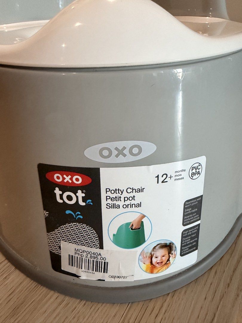 OXO Tot Potty Chair Grey (Category: Baby High Chairs) located in Taguig. Submitted by k_gie (Listing ID 1465057274, Image 2). Description: OXO Tot potty chair in grey and white. Designed for toddlers 12 months and older. High back support and non-slip base keep things stable. Seamless seat prevents pinching. Easy to clean. Original store sticker attached on the front..