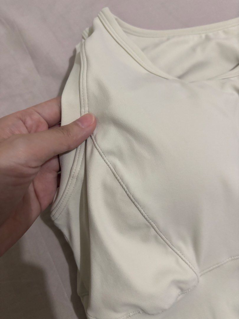 Padded Activewear Top (Category: Sleeveless) located in Caloocan City. Submitted by tineq (Listing ID 1465077107, Image 2). Description: Color: Off-white Built-in padded bra with removable cups for convenience and support RFS: bought from China online but unfortunately does not fit me. .