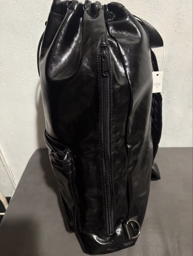 Patent bucket crossbody bag (Category: Backpacks) located in Manila. Submitted by bwshoppe (Listing ID 1464993612, Image 2). Description: Size: L 16” X W13”.