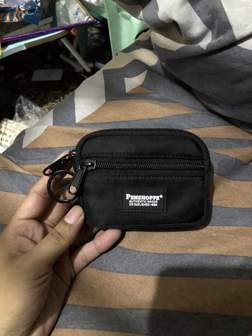 Penshoppe FS Mini Pouch / Coin Purse (Category: Wallets & Card Holders) located in San Juan, La Union. Submitted by declutteringog7 (Listing ID 1465112276, Image 1). Description: TITLE: Penshoppe FS Mini Pouch Black — Authentic Brand New PRICE: ₱180 CATEGORY: Bags & Wallets > Pouches & Coin Purses DESCRIPTION: Brand: Penshoppe – Authentic ✅ Color: Classic Black Original Price: ₱199 Details: • Smooth nylon fabric — lightweight & durable • Dual zip