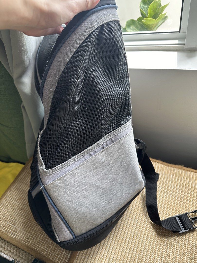 Pet Pals Grey Pet Carrier Backpack (Category: Homes & Other Pet Accessories) located in Mandaluyong City. Submitted by rustic_swirls (Listing ID 1464988384, Image 2). Description: - Brand: Pet Pals (sold at Pet Express) - Color: Grey - Features breathable mesh panels, padded shoulder straps, chest buckle, and top handle - Ideal for small cats and dogs - Price at Pet Express before was PHP 1900 - Has some signs of usage RFS: Sikip na yung dalawa k