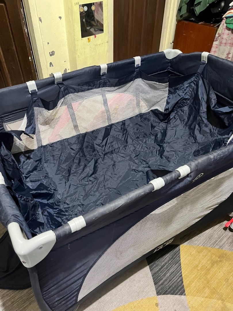 Phoenix Hub Baby Playpen Cot Navy Blue (Category: Cots & Cribs) located in Caloocan City. Submitted by safedolphin-a8cf (Listing ID 1465053237, Image 2). Description: - Brand: Phoenix Hub - Color: Navy Blue - Condition: Excellent / Well-maintained - All-around mesh siding for maximum breathability and ventilation - Multifunctional: Works as both a safe playpen and a comfortable cot - Complete inclusions: Collapsible frame, mattress base panels, a