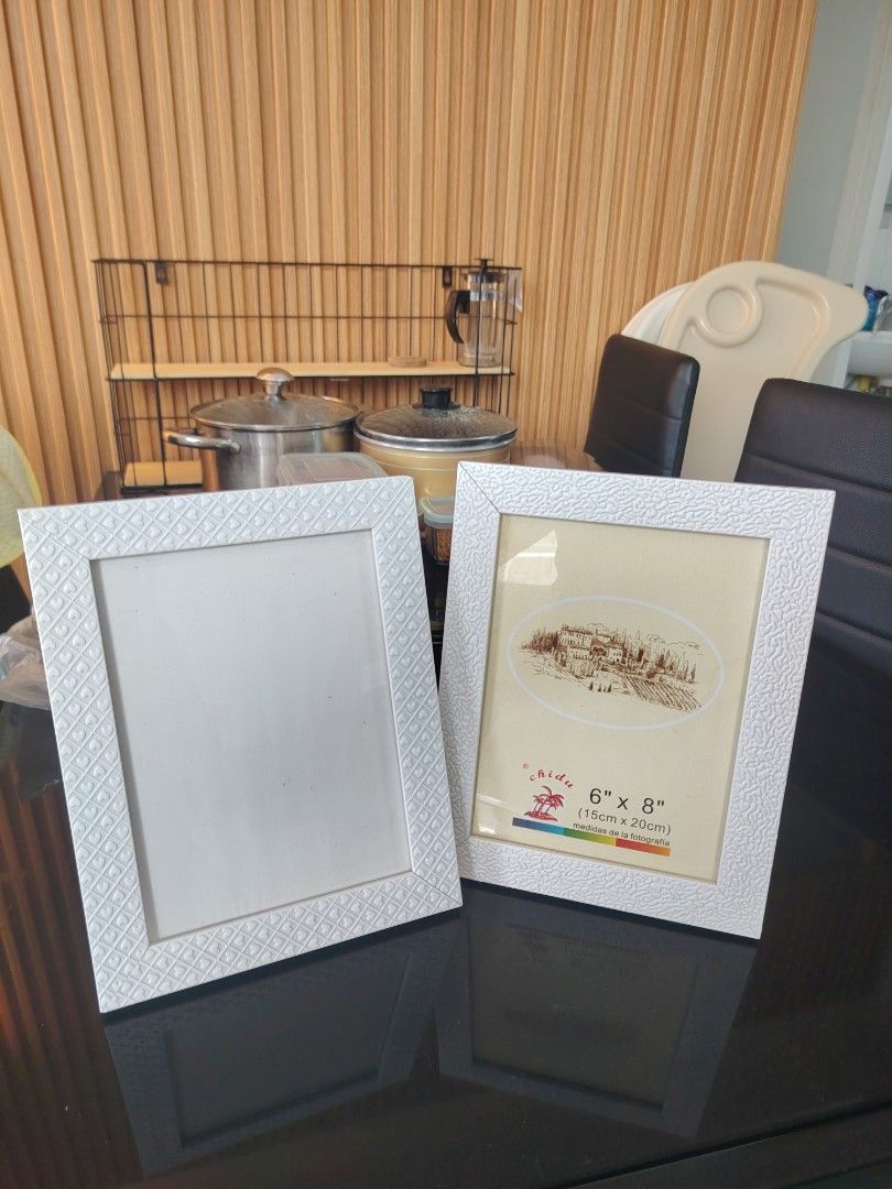 Photo frame (Category: Home Improvement Tools & Accessories) located in Makati City. Submitted by cess_preloved (Listing ID 1464977135, Image 1). Description: Take 2 fot 100 pesos only .