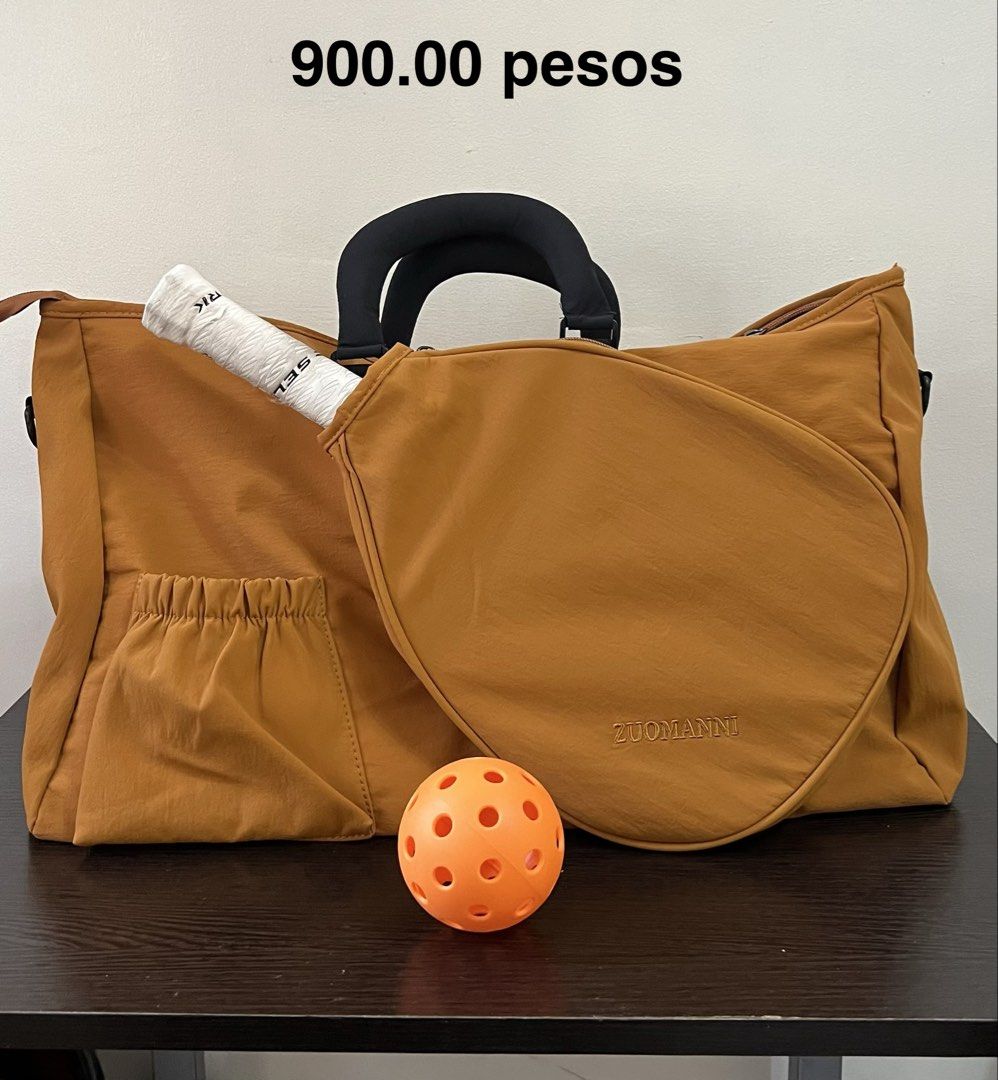 Pickleball / Badminton Bag with Paddle/Racket Pocket (Category: Racket and Ball Sports) located in Manila. Submitted by kendsg (Listing ID 1465001214, Image 1). Description: - Design: Solid color with durable fabric construction - Exterior Paddle Pocket: Specifically sized for your pickleball paddle or badminton racket - Side Pouch: Great for balls and small accessories - Roomy Main Compartment: Easily fits extra gear, clothes, or towels - Carryi