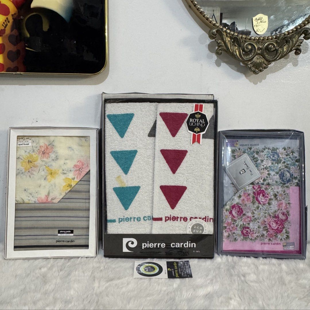 Pierre Cardin bundle Towel and Handkerchief Gift Sets (Category: Bedding & Towels) located in Rizal. Submitted by houseofbell (Listing ID 1465137762, Image 1). Description: - Authentic Pierre Cardin boxed sets (3 boxes in total) - Middle box: Royal Uchino collaboration towel set (2 white towels with blue/red geometric triangle patterns) - Left and right boxes: Premium patterned handkerchief sets (chic floral prints and classic striped designs) - 