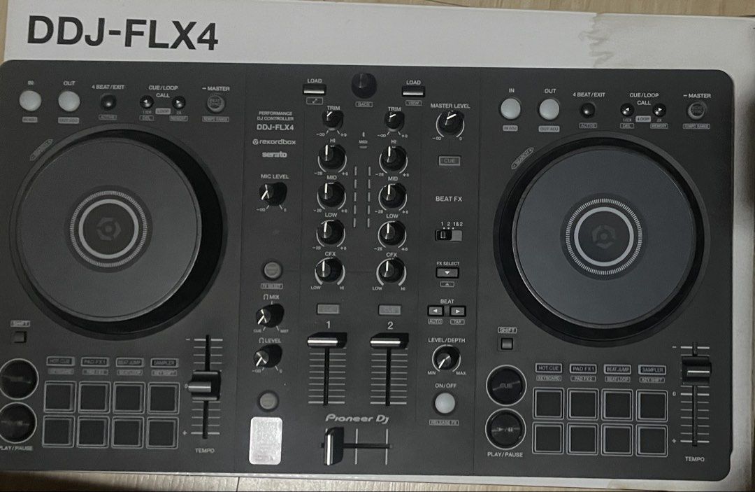 Pioneer DJ DDJ-FLX4 2-channel DJ Controller (Category: Musical Instruments) located in Manila. Submitted by miafagg0th (Listing ID 1465063290, Image 2). Description: Pioneer DJ DDJ-FLX4 controller. Two-channel setup, compatible with rekordbox and Serato. Standard layout with performance pads, jog wheels, mixer section, and EQ knobs. Direct USB connection. Great entry-level gear for mixing tracks at home or gigs. Clean unit, works smoothly. Origin
