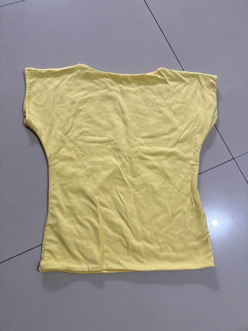 Plain yellow top (Category: Shirts) located in Rizal. Submitted by sidehustleniategirl (Listing ID 1464995980, Image 1). Description: can fit to small-medium 50 pesos only.