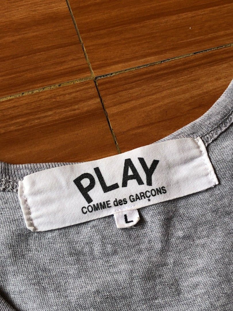 PLAY CDG BLACK HEART SHIRT (Category: Tshirts & Polo Shirts ) located in Baybay. Submitted by dathrifted (Listing ID 1465031521, Image 3). Description: PLAY CDG BLACK HEART SHIRT LARGE ON TAG Width- 21 Length- 28.5 EXCELLENT CONDITION FADED WASHTAG PM if Interested📩📩📩.