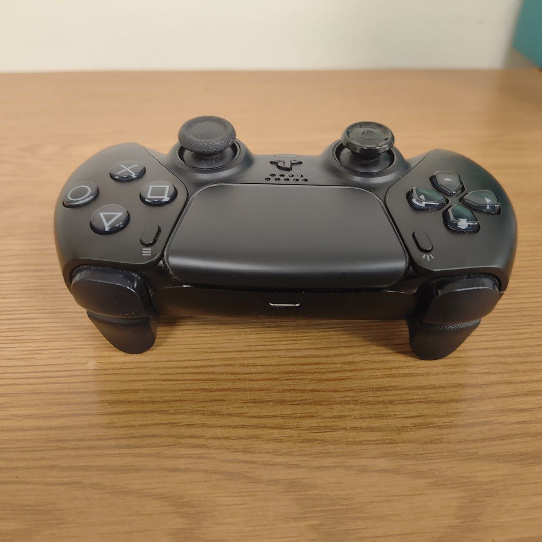 PlayStation 5 Console Controllers and Games Bundle (Category: PlayStation) located in Las Pinas. Submitted by nekomeow22 (Listing ID 1464997598, Image 3). Description: - Complete PlayStation 5 console setup including controllers w/ 36 games - Includes 6 top-tier physical/digital games: * PS5 Dirt 5 Day One Edition * Suicide Squad Kill the Justice League Deluxe Edition * Ghost of Tsushima * Days Gone * No Man's Sky * Ninja Gaiden Sigma.