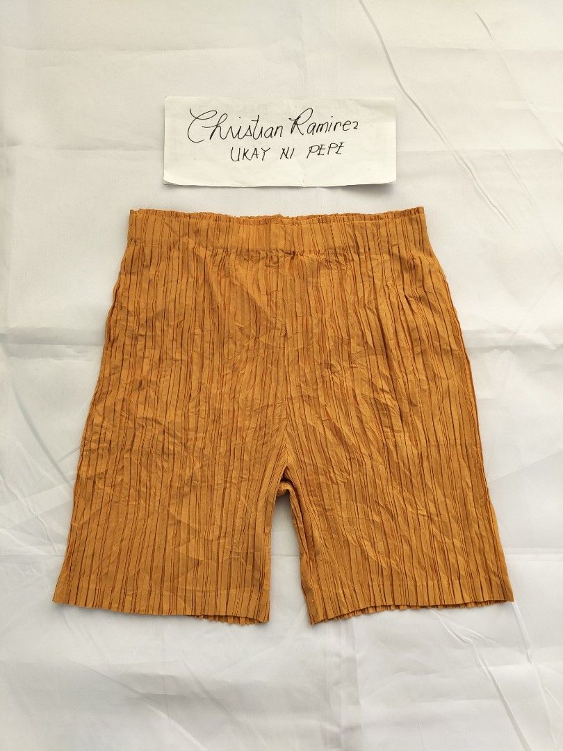 Pleats please by Issey miyake shorts (Category: Shorts) located in Bocaue. Submitted by ukaynipepe (Listing ID 1464977403, Image 2). Description: Pleats please by issey miyake pleated shorts mustard yellow colorway size 3 on tag Waist 28-36 Length 18 Excellent condition No flaws.