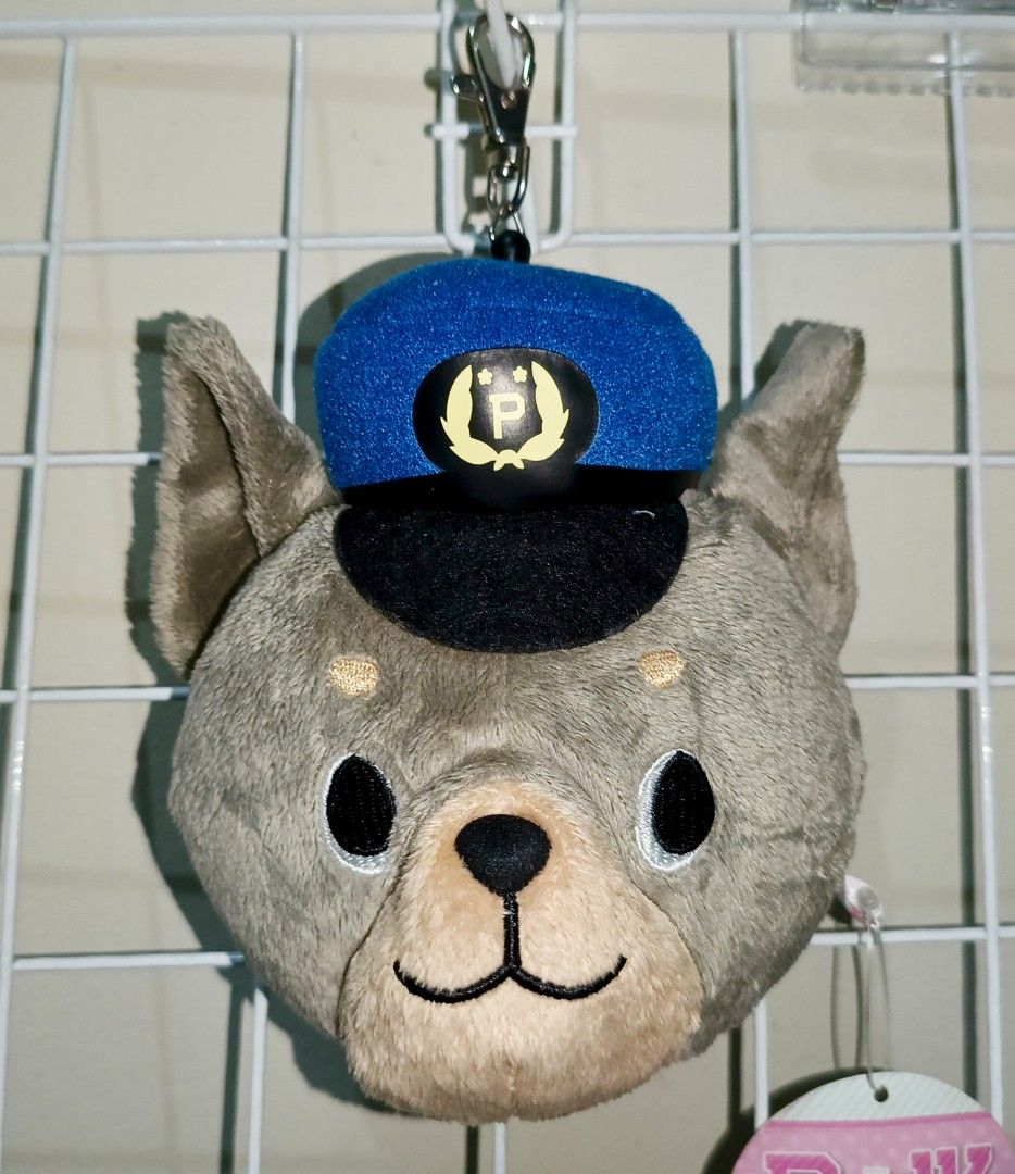 Police Dog Plush Keychain Retractable ID Holder (Category: Plushies & Soft Toys) located in Pasig City. Submitted by sleepyfairy (Listing ID 1464976665, Image 1). Description: Dog plush retractable ID holder I can give discount if you buy 3 plushie charms message me if you have questions about the item 🫶🏻 shipping fee shouldered by buyer 🩷.
