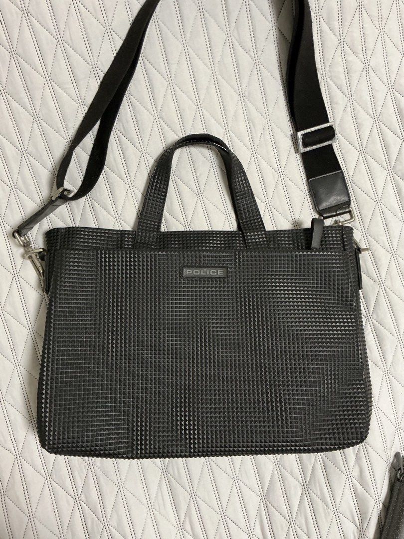 POLICE Laptop Briefcase Bag (Category: Briefcases) located in Makati City. Submitted by boldturtle-8720 (Listing ID 1465130549, Image 2). Description: Black Police Borsa Pyramid Bag featuring a textured geometric pyramid pattern, dual carry handles, and an adjustable shoulder strap 17” x 11” x 3”.