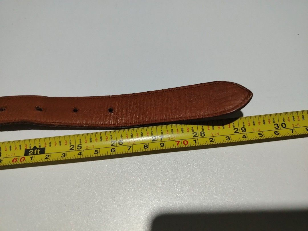 Polo ralph lauren leather belt (Category: Luxury Apparel) located in Manila. Submitted by rockandrolly (Listing ID 1465106330, Image 2). Description: ✅ Brand: Polo Ralph Lauren 🇺🇸 — embossed logo & Pony emblem ✅ Material: Premium tan/brown full-grain leather — leather-covered buckle with brass pin ✅ Size: 26" / 65cm — fits waist 24"–26" ✅ Condition: Pre-owned — lovely natural patina, solid leather, no tears or damage ✅ Versatile classic design 