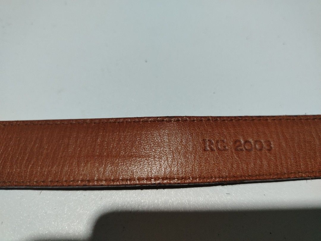 Polo ralph lauren leather belt (Category: Luxury Apparel) located in Manila. Submitted by rockandrolly (Listing ID 1465106330, Image 3). Description: ✅ Brand: Polo Ralph Lauren 🇺🇸 — embossed logo & Pony emblem ✅ Material: Premium tan/brown full-grain leather — leather-covered buckle with brass pin ✅ Size: 26" / 65cm — fits waist 24"–26" ✅ Condition: Pre-owned — lovely natural patina, solid leather, no tears or damage ✅ Versatile classic design 
