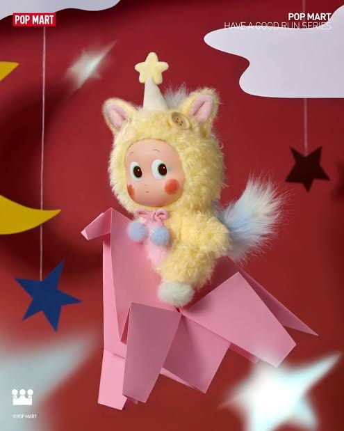 POP MART Have a Good Run Series Twinkle Twinkle (Category: Plushies & Soft Toys) located in Mandaluyong City. Submitted by xialeigh (Listing ID 1464979889, Image 2). Description: - POP MART Have a Good Run series - Twinkle Twinkle character - Yellow furry plush outfit with star antenna on hood - Features big round eyes, pink cheeks, and star print - Pink tummy with blue pom-pom chest ties and wooden button hood detail - Clean condition with origi