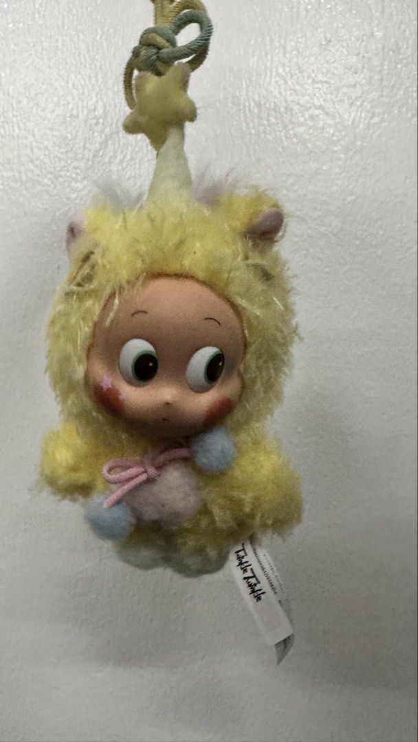 POP MART Have a Good Run Series Twinkle Twinkle (Category: Plushies & Soft Toys) located in Mandaluyong City. Submitted by xialeigh (Listing ID 1464979889, Image 3). Description: - POP MART Have a Good Run series - Twinkle Twinkle character - Yellow furry plush outfit with star antenna on hood - Features big round eyes, pink cheeks, and star print - Pink tummy with blue pom-pom chest ties and wooden button hood detail - Clean condition with origi