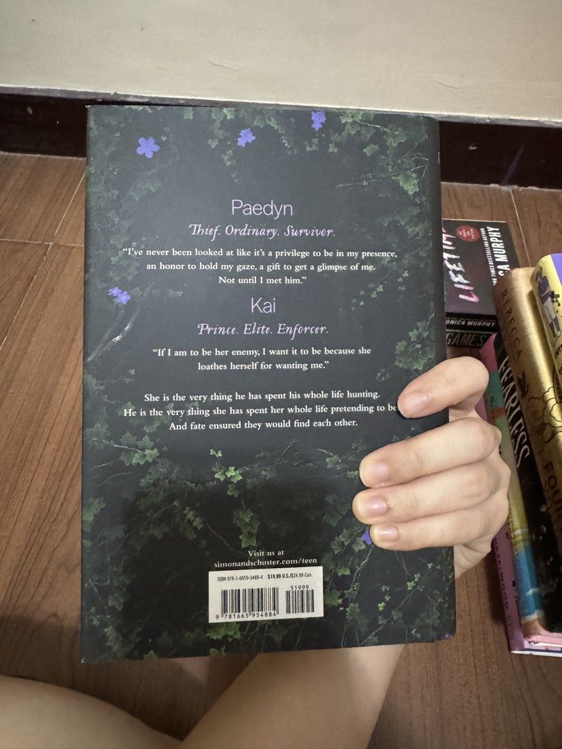 Powerless by Lauren Roberts Paperback Novel (Category: Storybooks) located in Pasig City. Submitted by jubinnnie (Listing ID 1465042035, Image 3). Description: - Title: Powerless by Lauren Roberts - Genre: Fantasy Romance (Paedyn & Kai) - Edition: Paperback with black sprayed edges - Status: New York Times bestseller & BookTok viral hit.