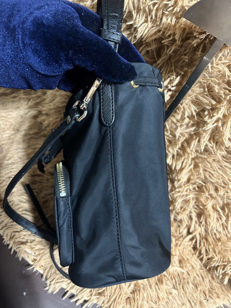Prada Nylon Leather bucket Two-way Bag (Category: Luxury Bags & Wallets) located in Iloilo. Submitted by thrift-to-thrift-ukay (Listing ID 1465059726, Image 3). Description: Prada Nylon Leather bucket Two-way Bag Size Small Rank Ab to A Condition Authentic/Legit .