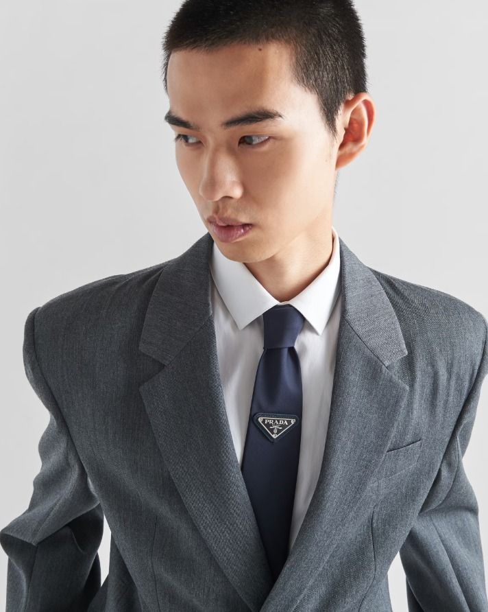 Prada Re-Nylon Gabardine Tie | Black | Complete Set (Category: Ties) located in Bacoor. Submitted by fafofa (Listing ID 1465104162, Image 1). Description: Prada Re-Nylon Gabardine Tie in black, featuring the iconic enameled metal Prada triangle logo. • Prada Re-Nylon Gabardine • Black • Enameled metal triangle logo • Complete set • Includes original box • Includes tags.