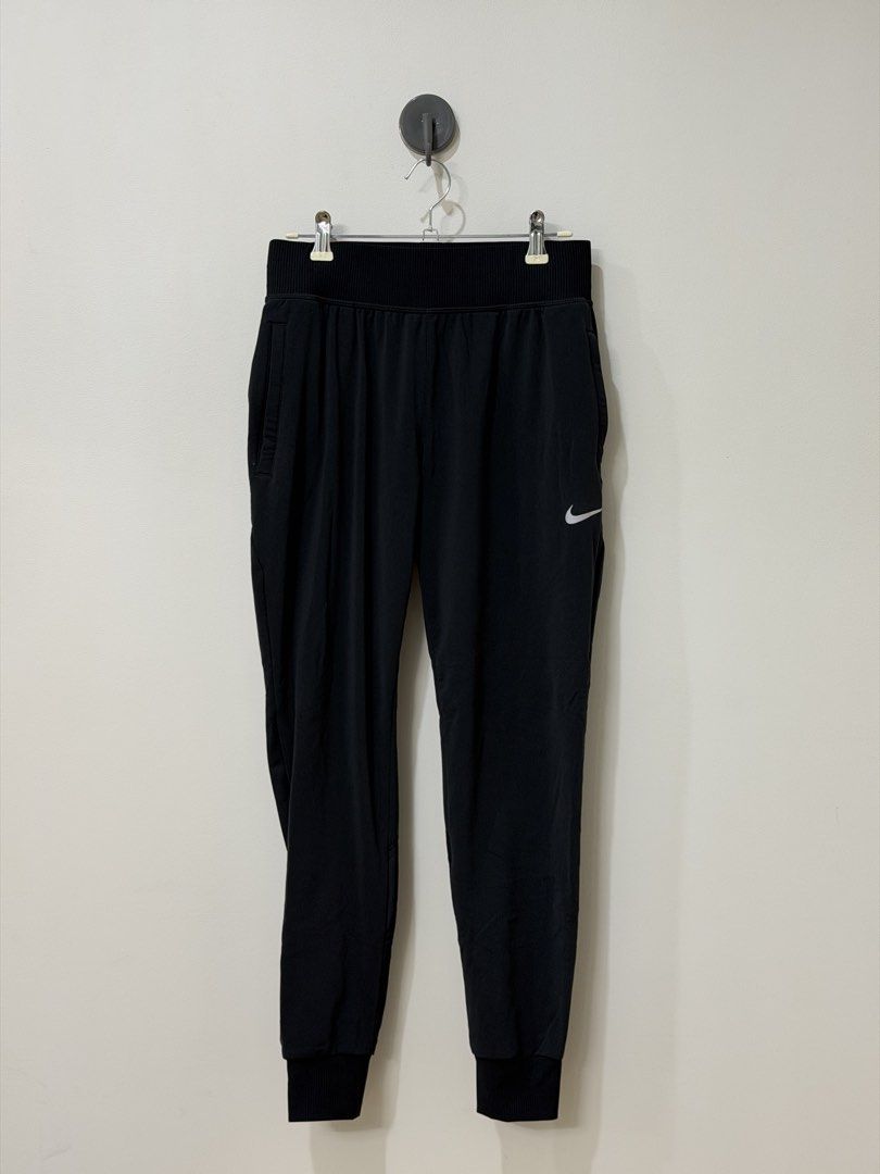 Preloved ★ NIKE Dri-Fit Joggers (Category: Activewear) located in San Juan City. Submitted by curated.club (Listing ID 1465076612, Image 1). Description: ★ please read bio before ordering ★ actual item color may differ slightly due to lighting and screen settings ★ cut tags ★ small stain by the right pocket (see photo 04).