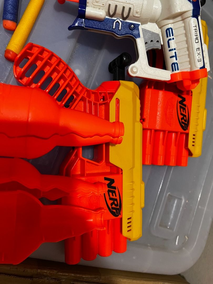 Pre-loved: Nerf Guns (Take all) (Category: Action & Battle Toys) located in Mandaluyong City. Submitted by moonamor (Listing ID 1465025779, Image 2). Description: Set includes 3 nerf guns, two pretend bottle, and 8 foam bullets (some are bent).
