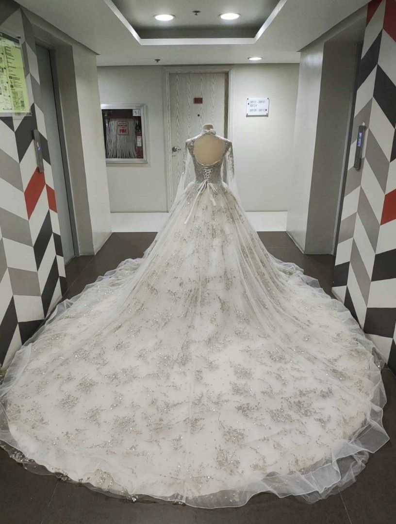 Preloved Sparkly Princess Wedding Gown | Long Train | Worn Once (Category: Evening dresses & gowns) located in Cavite. Submitted by dee.fama (Listing ID 1465145313, Image 3). Description: ✨ PRELOVED WEDDING GOWN + FREE BRIDAL ACCESSORIES - WORN ONCE ✨ Letting go of my beautiful wedding gown. Perfect for brides looking for a sparkly princess/ball gown with a dramatic long train at a more affordable price. Ready to make another bride feel beautiful