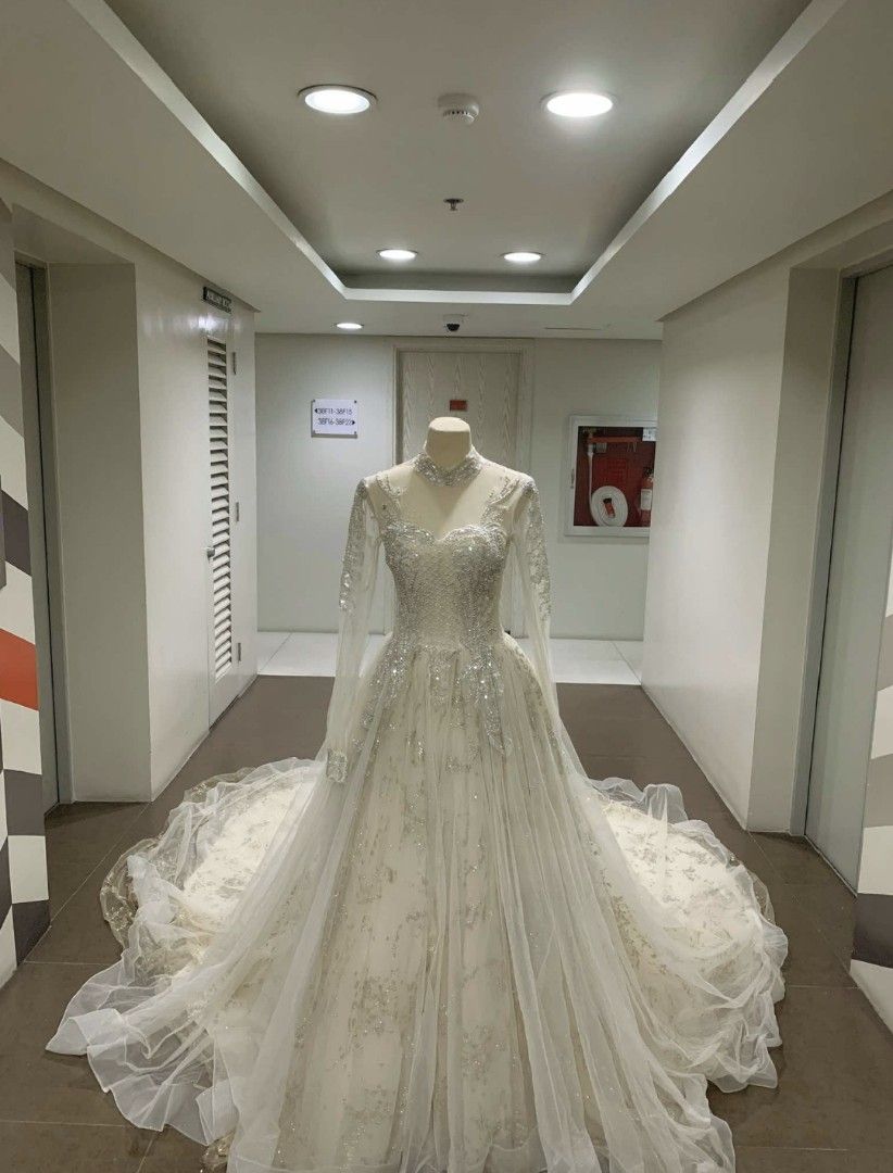 Preloved Sparkly Princess Wedding Gown | Long Train | Worn Once (Category: Evening dresses & gowns) located in Cavite. Submitted by dee.fama (Listing ID 1465145313, Image 2). Description: ✨ PRELOVED WEDDING GOWN + FREE BRIDAL ACCESSORIES - WORN ONCE ✨ Letting go of my beautiful wedding gown. Perfect for brides looking for a sparkly princess/ball gown with a dramatic long train at a more affordable price. Ready to make another bride feel beautiful