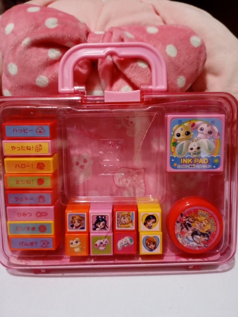 Pretty cute stamp set (Category: Stationery & School Supplies) located in Manila. Submitted by ysabel1102 (Listing ID 1465108170, Image 2). Description: *pretty cute stamp with case *case has damage crack at the back as you can see in the photos * missing note pad * all stamp are complete and UN used * with 2 ink pad.