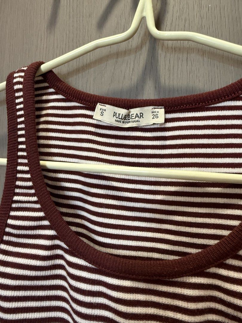 Pull&Bear Striped Ribbed Crop Tank Top Size S (Category: Sleeveless) located in Manila. Submitted by elisesnts (Listing ID 1465047662, Image 2). Description: - Brand: Pull&Bear - Style: Maroon & white striped crop tank top - Size: S RFS: not my style anymore.