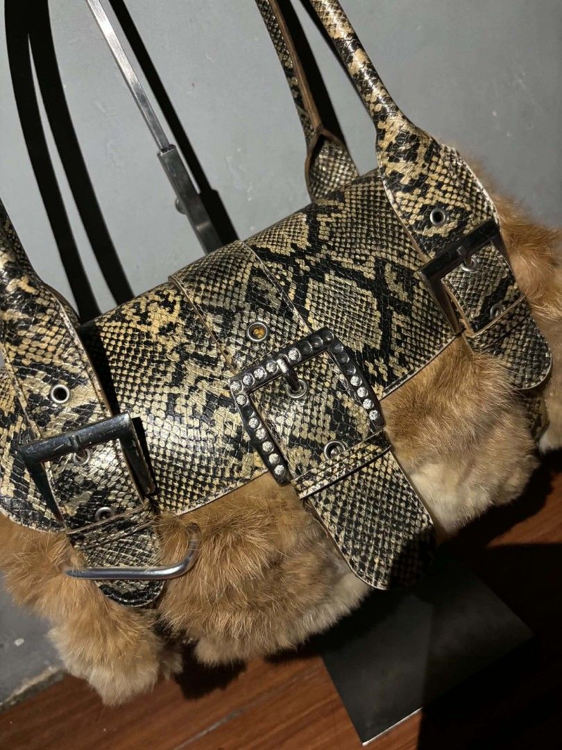 Python skin (Category: Shoulder Bags) located in Manila. Submitted by juicygirl_02 (Listing ID 1465058836, Image 3). Description: Random python snakeskin trim and plush brown fur.