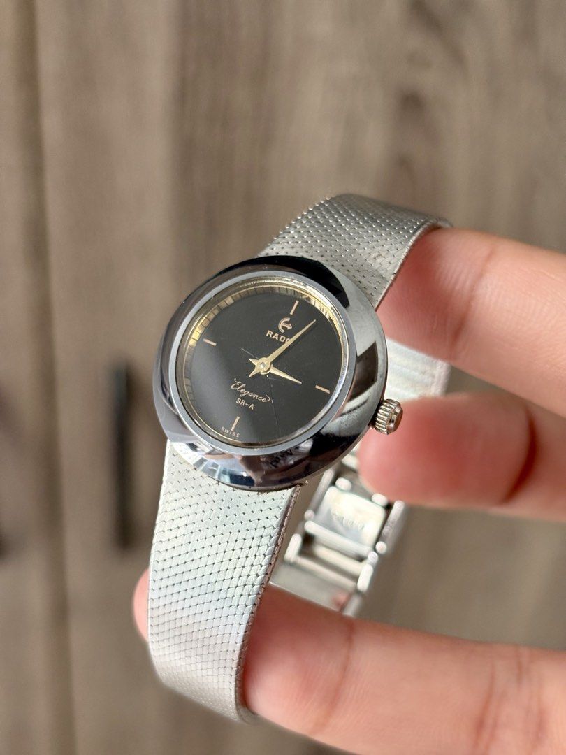 Rado Elegance SR-A (Category: Women's Watches) located in Bulacan. Submitted by whatsonyourwristmnl (Listing ID 1465014816, Image 2). Description: Vintage Rado Elegance SR-A | Manual Winding A beautiful vintage Rado Elegance SR-A featuring a striking minimalist black dial and original integrated stainless steel mesh bracelet. An understated piece with timeless, old-money appeal. • Ref.: N1061732 (approx 27mm) • Movement: Swiss manual-winding mech