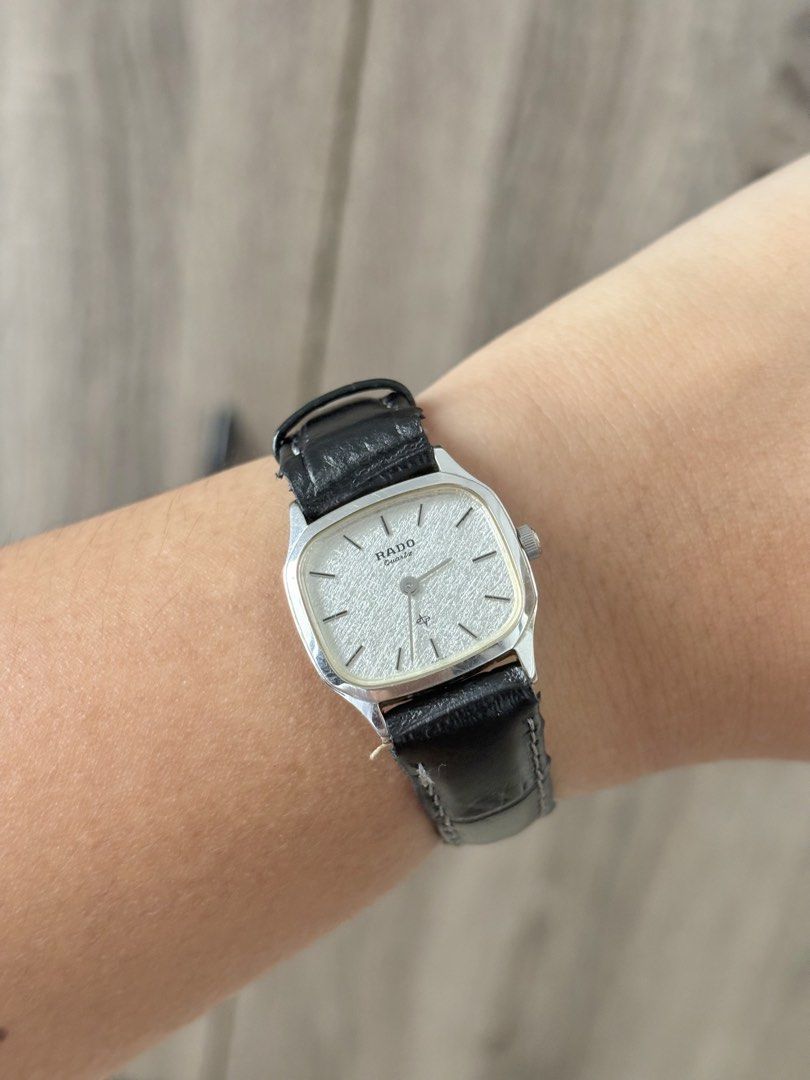 Rado Tank Ladies (Category: Women's Watches) located in Bulacan. Submitted by whatsonyourwristmnl (Listing ID 1465014661, Image 3). Description: Vintage Rado Tank Swiss Quartz — Ref. 133.9520.2 A beautifully understated vintage Rado dress watch featuring a distinctive silver linen-textured dial, complemented by crisp black stick markers. Its refined tank-style case gives it a timeless, elegant presence—equally suited to formal occasions or unders