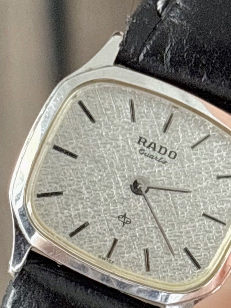 Rado Tank Ladies (Category: Women's Watches) located in Bulacan. Submitted by whatsonyourwristmnl (Listing ID 1465014661, Image 2). Description: Vintage Rado Tank Swiss Quartz — Ref. 133.9520.2 A beautifully understated vintage Rado dress watch featuring a distinctive silver linen-textured dial, complemented by crisp black stick markers. Its refined tank-style case gives it a timeless, elegant presence—equally suited to formal occasions or unders
