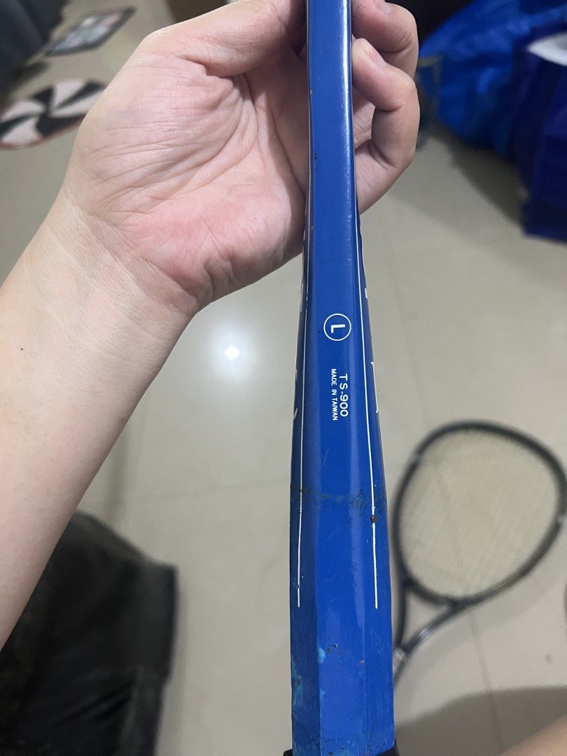 Rainbow Sky Shot E TS-900 Tennis Racket (Category: Racket and Ball Sports) located in Manila. Submitted by ajdfinds (Listing ID 1465003422, Image 3). Description: - Model: Rainbow Sky Shot E TS-900 (Made in Taiwan) - Design: Blue frame with a stylish wooden top accent and white strings - Grip: Black grip tape with an 'E' logo on the bottom cap - Condition: Normal wear on the paint and frame from previous play - Great for casual play or collectors