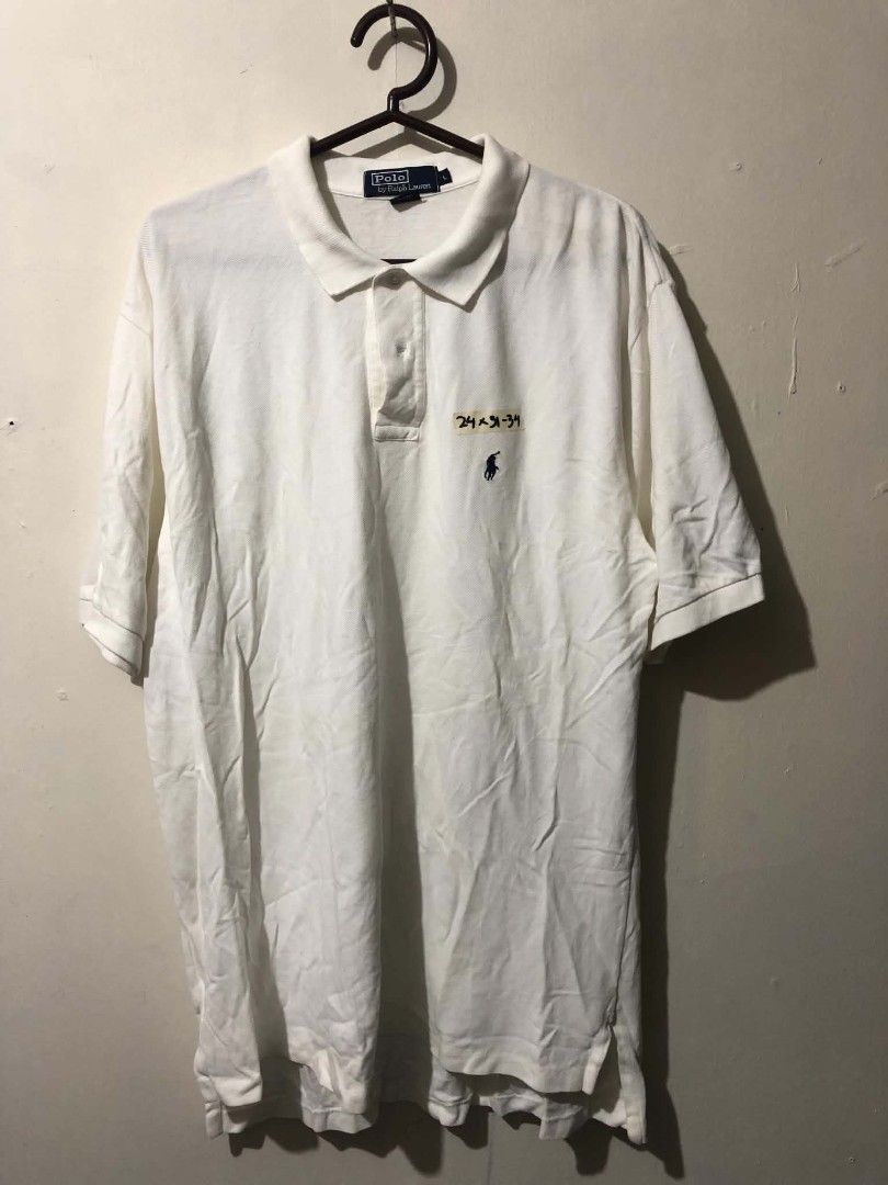 Ralph Lauren Polo Shirt (Category: Tshirts & Polo Shirts ) located in Pasig City. Submitted by geloangelo17550 (Listing ID 1465156005, Image 1). Description: Authentic Excellent condition Issue 1 missing button / need wash.