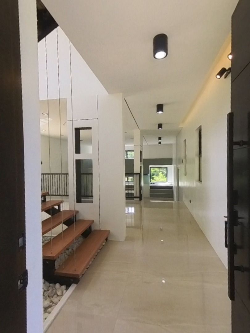 Ramin House & Lot (Category: House & Lot) located in Antipolo. Submitted by eastside_estatesph (Listing ID 1464990196, Image 3). Description: Sun Valley Estates House & Lot at Sun Valley with view of Sun Valley golf course hole # 2 & #3 Lot Area 303 sqm – downhill lot Floor Area 283 sqm 1 covered parking + 2 open parking Landscaped garden GROUND FLOOR Living room with Lanai Powder room Dining Room Kitchen Guest room with T&B SECOND FLOOR Family R