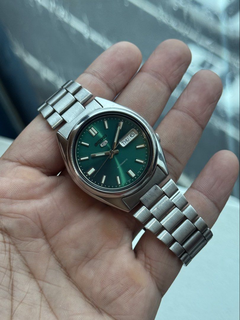 Rare Seiko SNX447 Emerald Green (Category: Men's Watches) located in Manila. Submitted by alabgolden (Listing ID 1465059495, Image 2). Description: For sale is a very rare and clean example of Seiko SNX447 Known for its emerald green sunburst dial, this watch is now rarely seen in the market especially a clean one. Don’t miss your chance to own such beautiful piece! Case: 37mm — open glass caseback 7s26 Movement Serviced Comes with free AM solid 