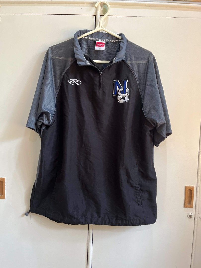 Rawlings Short Sleeve Quarter Zip Pullover Jacket Black Grey M (Category: Coats, Jackets and Outerwear) located in Iloilo. Submitted by franzventures (Listing ID 1464970802, Image 1). Description: - Brand: Rawlings - Size: Medium - Color: Black and grey - Style: Short sleeve quarter-zip windshirt with mock neck - Ventilation: Mesh sleeves and upper back panel - Details: Embroidered right chest logo, left NS patch, adjustable drawstring hem - Cond