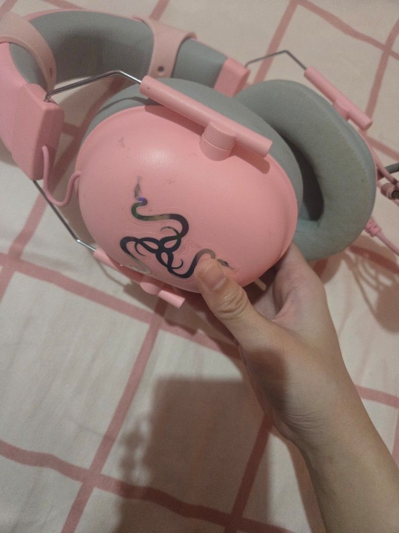 Razer Quartz Pink Gaming Headset with Cat Ears (Category: Headphones & Headsets) located in Manila. Submitted by misushoppa (Listing ID 1465107571, Image 3). Description: Razer Gaming Headset color: pink with separate brand of cat ears condition: 9/10 issue lang yung mismong foam ng microphone since yellowish na, replacable naman siya rfs: hindi na nagagamit, tambak lang sa table. actually di talaga siya nagamit, impulsive buy lang. working, no i