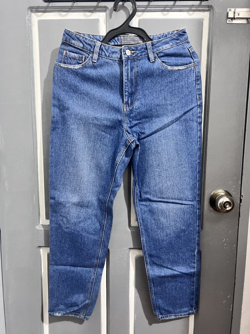 Regatta Blue Denim Jeans Size 27 (Category: Jeans) located in Lubao. Submitted by ad_apparel (Listing ID 1465036358, Image 1). Description: - Brand: Regatta - Size: 27 (tag attached inside) - Style: Straight leg, medium wash with subtle fading - Closure: Standard button and zipper fly - Pockets: Two front pockets, two back patch pockets.