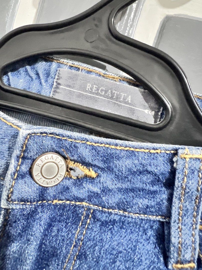 Regatta Blue Denim Jeans Size 27 (Category: Jeans) located in Lubao. Submitted by ad_apparel (Listing ID 1465036358, Image 2). Description: - Brand: Regatta - Size: 27 (tag attached inside) - Style: Straight leg, medium wash with subtle fading - Closure: Standard button and zipper fly - Pockets: Two front pockets, two back patch pockets.