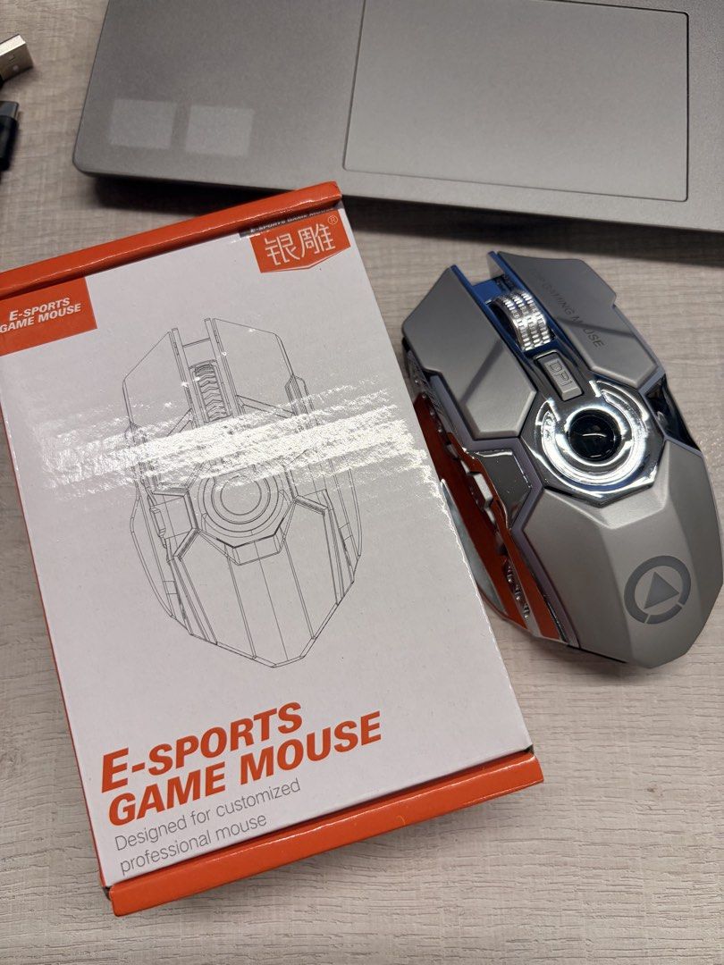 RGB Silent-type Dual Mode Gaming Mouse (Category: Mouse & Mousepads) located in Pasig City. Submitted by mxbutterfly (Listing ID 1465001324, Image 1). Description: New Dual mode - wired/wireless 8 buttons Just bought yesterday at orange app (see photo) Only opened to check RFS: i prefer clicky mouse 😅.