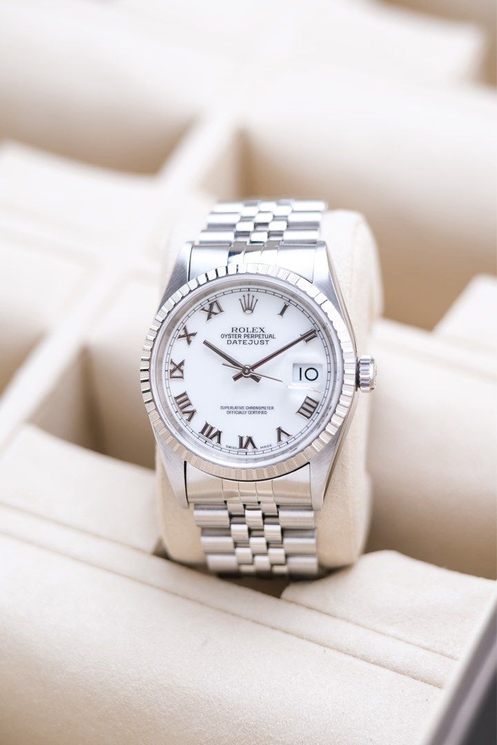 Rolex Datejust 16220 (Category: Luxury Watches) located in Quezon City. Submitted by awristotell (Listing ID 1465071545, Image 3). Description: “Another Wrist To Tell” Rolex Datejust 36 Porcelain White Roman Dial Mint Condition Price: 328,000 PHP Ref: 16220 Year: 1996 Movement: Automatic Crystal: Sapphire Case: 36mm Material: Steel Lug width: 20mm Bracelet: Rolex Jubileee Bracelet Includes: Presentation Box / Leather Pouch — Free Shipping Nationw