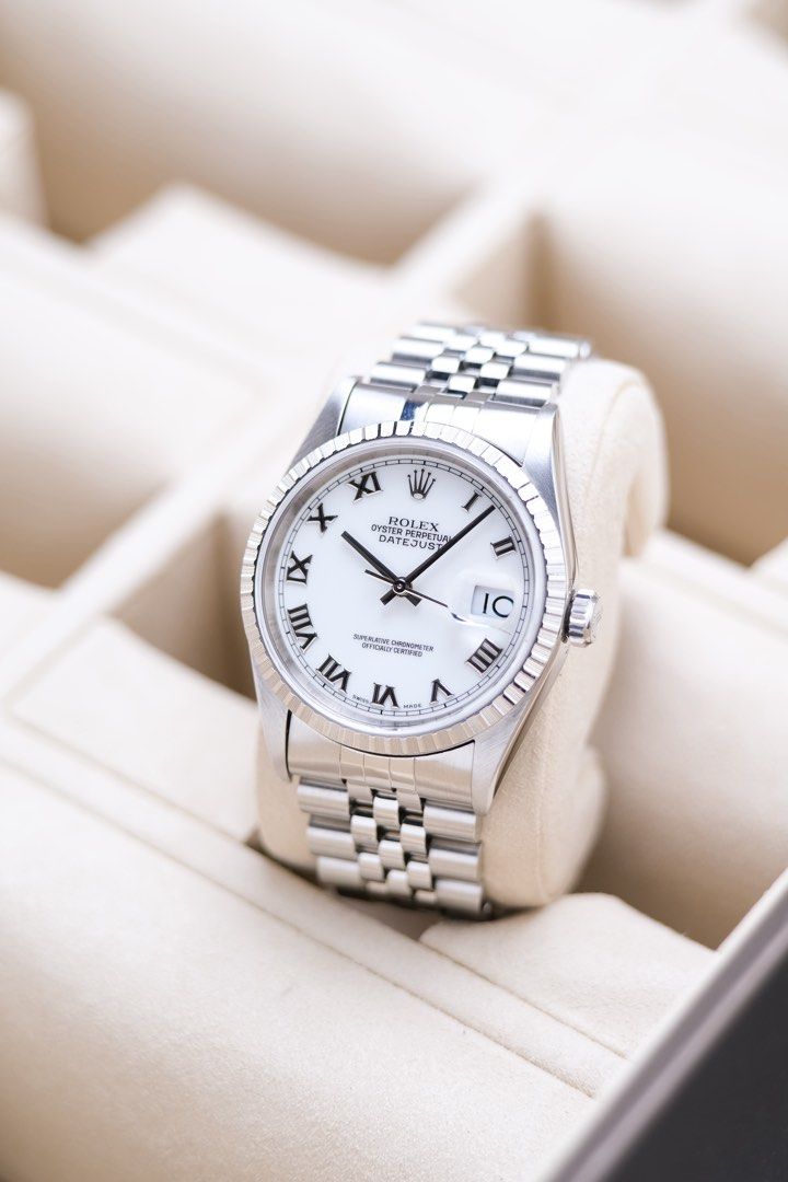 Rolex Datejust 16220 (Category: Luxury Watches) located in Quezon City. Submitted by awristotell (Listing ID 1465071545, Image 1). Description: “Another Wrist To Tell” Rolex Datejust 36 Porcelain White Roman Dial Mint Condition Price: 328,000 PHP Ref: 16220 Year: 1996 Movement: Automatic Crystal: Sapphire Case: 36mm Material: Steel Lug width: 20mm Bracelet: Rolex Jubileee Bracelet Includes: Presentation Box / Leather Pouch — Free Shipping Nationw