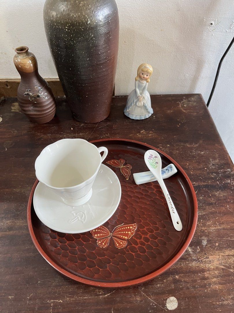 Round Laquer Tray with Butterfly Inlay (Category: Dinnerware & Cutlery) located in Taguig. Submitted by minmin_parker (Listing ID 1465022231, Image 2). Description: - Beautiful round wooden serving tray with a deep reddish-brown finish - Unique hammered texture all over the surface with classic Japanese style - Features two elegant decorative butterflies inlaid with gold dot details - Raised edges keep cups, plates, and glasses secure while carry