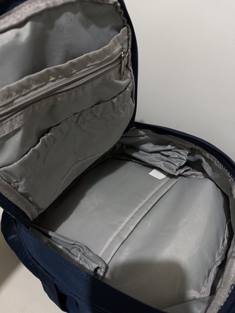Ruffless Navy Blue Mini Backpack (Category: Backpacks) located in Rizal. Submitted by lmbelle (Listing ID 1462884282, Image 3). Description: Size: 23 L × 9 W x 30.5 H cm Weight: 0.52 kg Capacity: 6 L Twill fabric Water- repellent Can also do shipping (not included in price).