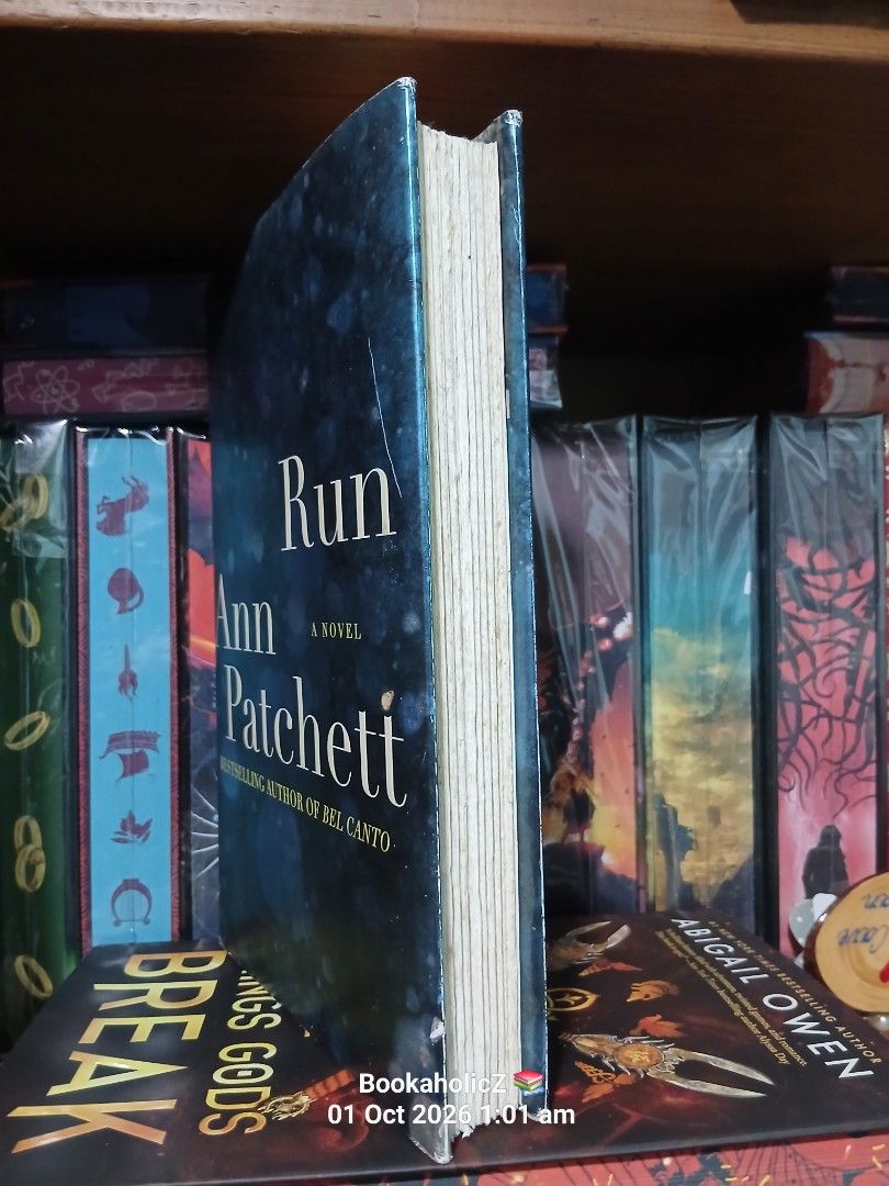 Run by Ann Patchett Novel (Category: Storybooks) located in Antipolo. Submitted by bookaholicz_dettori (Listing ID 1465137173, Image 3). Description: Hardcover novel titled Run by bestselling author Ann Patchett. Dark blue abstract cover design. Spine clearly shows title and author names. Pages show some tanning and spotting along the edges from age. Clean text block overall. MOP: •Gcash/Bank transfer •No SCO / No COD •Payment first •PM for queri