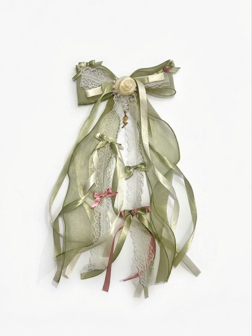 Sage Green Lace Hair Bow (Category: Hair Accessories) located in Bulacan. Submitted by mei_declutters (Listing ID 1465071822, Image 1). Description: Hello! I’m selling my customized hair bow from an fb seller. I only worn it one sa isang school event. Since then, hindi ko na siya nagagamit. Super bango pa niya, swear! Perfect for strawberry matcha theme lovers🩷💚 Get this now for 350 only (much lower compared to the original price)✨.