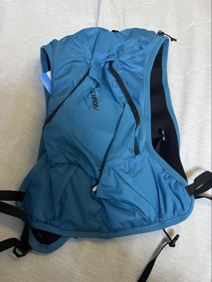 Salomon Cross 4 Hydration Vest (Category: Vests) located in Makati City. Submitted by sphpnd (Listing ID 1465155330, Image 2). Description: - Model: Salomon Cross 4 Hydration Vest - Colorway: Tahitian Tide and Black - Condition: Brand new with original store tags and ticketing attached - Material: Lightweight, breathable mesh construction ideal for running and trail activities - Storage: Multiple convenient front pockets for easy access on the go